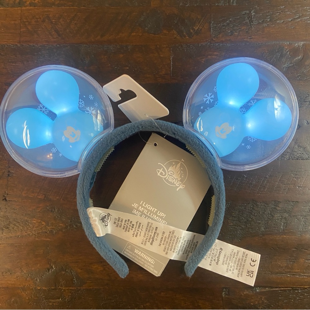 Disney Parks Mickey Mouse Snowman Balloon
Light-Up Ear Headband for Adult NEW